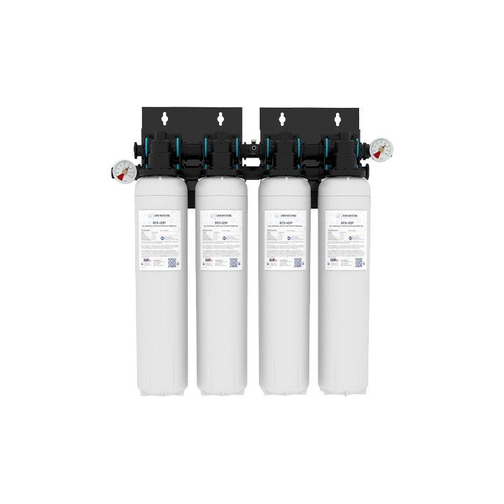 Four white cylindrical water filter tanks mounted side by side on a black bracket with gauges on the ends and label stickers on the tanks.